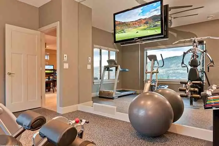 wellness-fitness-center-with-tv.webp